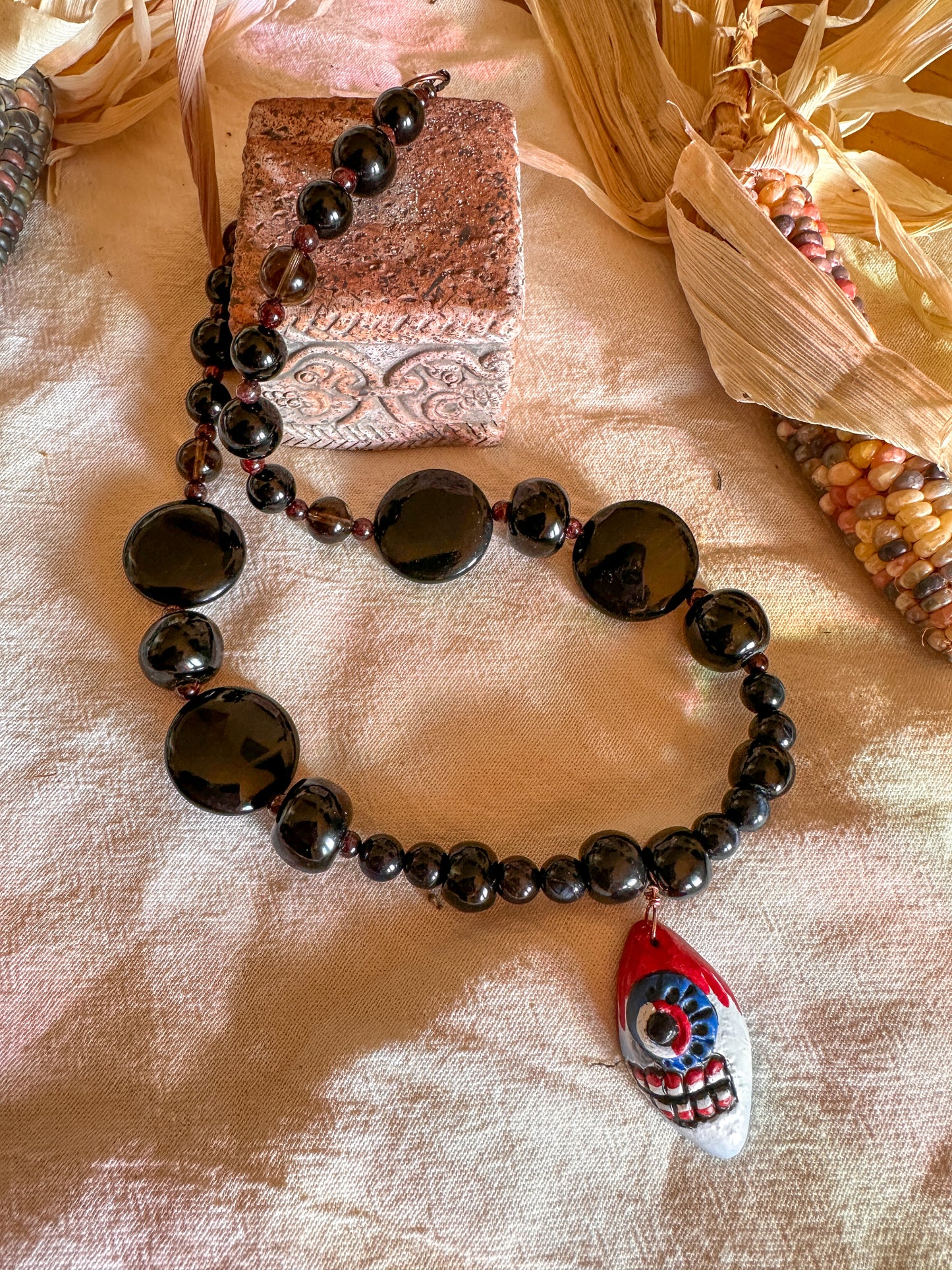 Handpainted Tecpatl and precious beads necklace